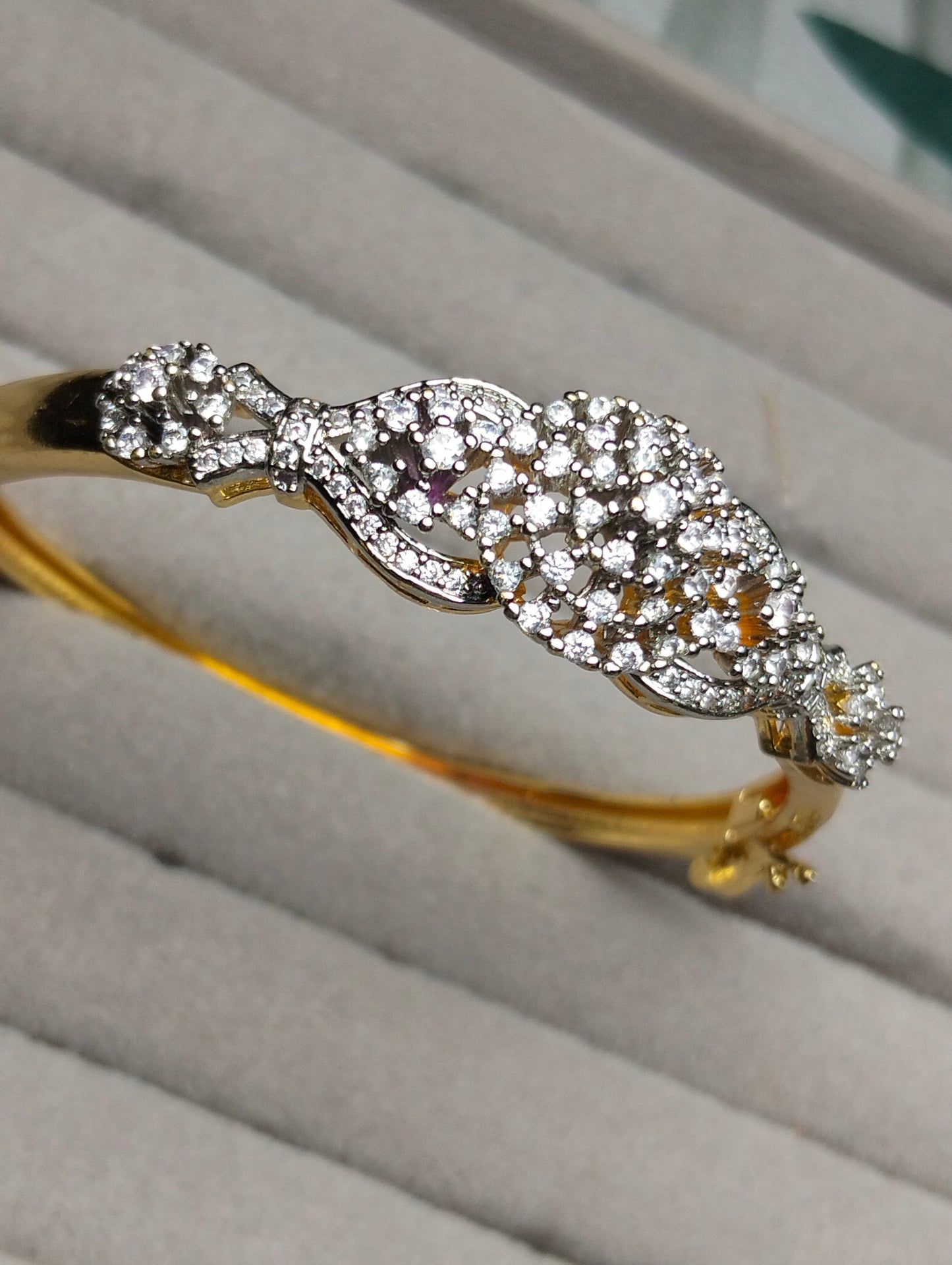Gold plated openable bangel with cubic zircon