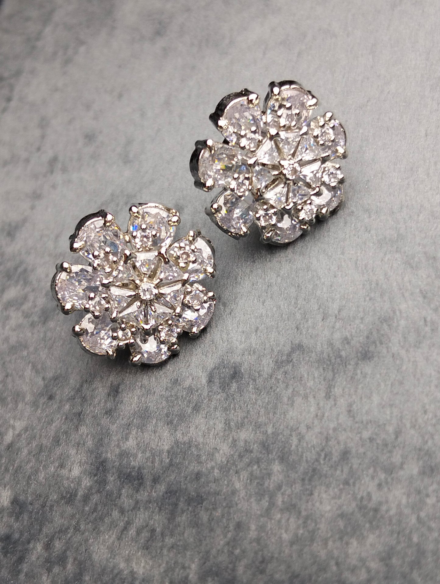 Silver stud in white stone