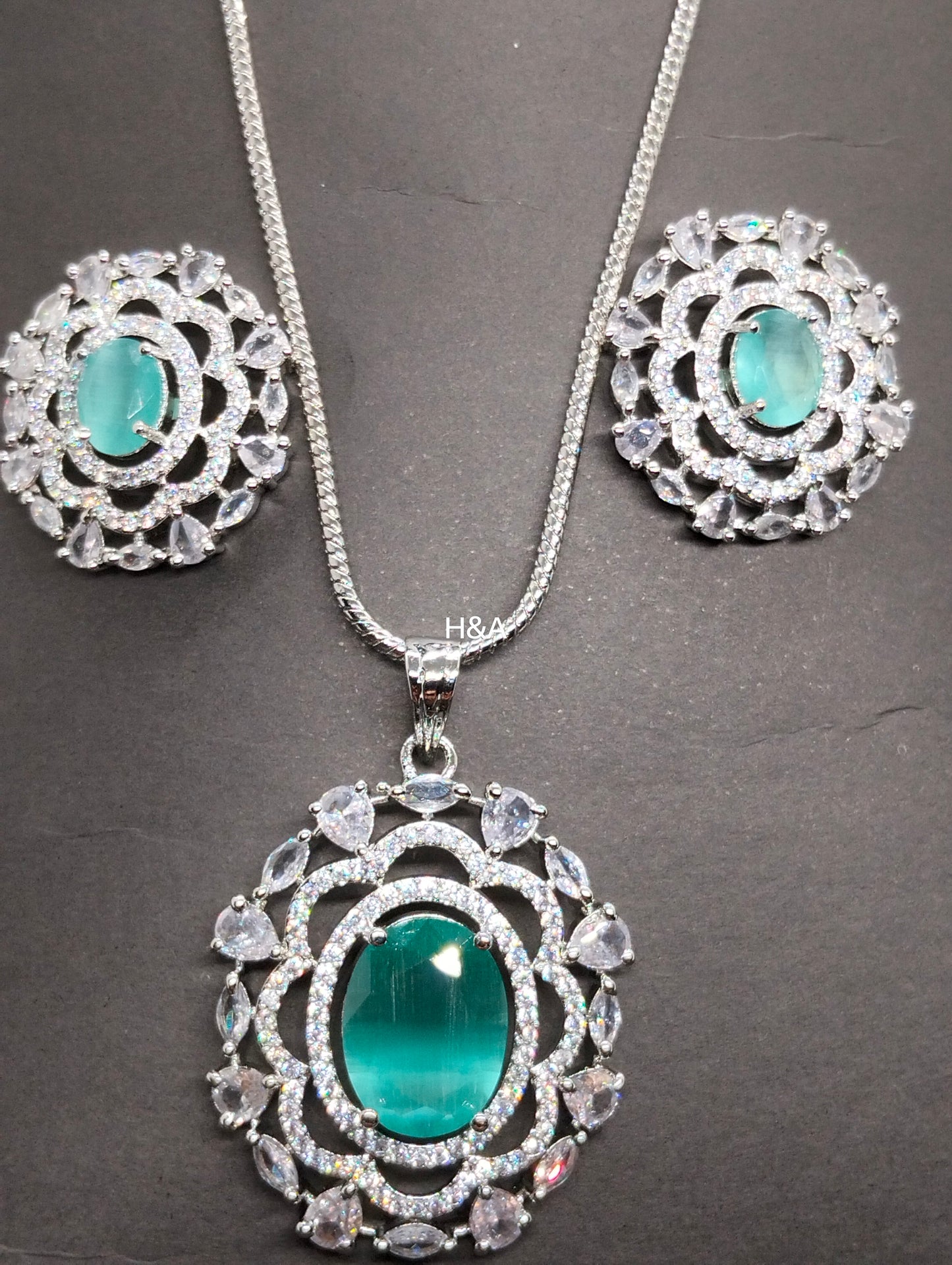 One carat mint green stone pendant set with cubic zircon