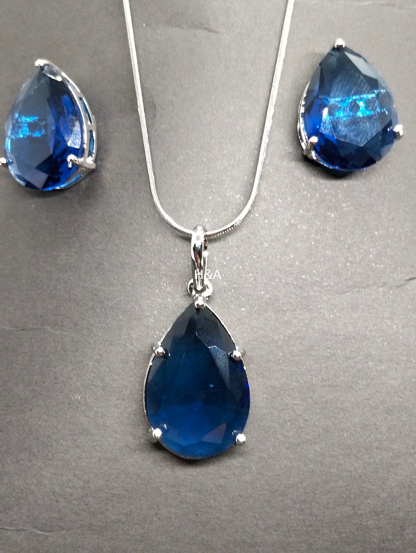 Blue Sapphire silver rhodium plated pendant set
