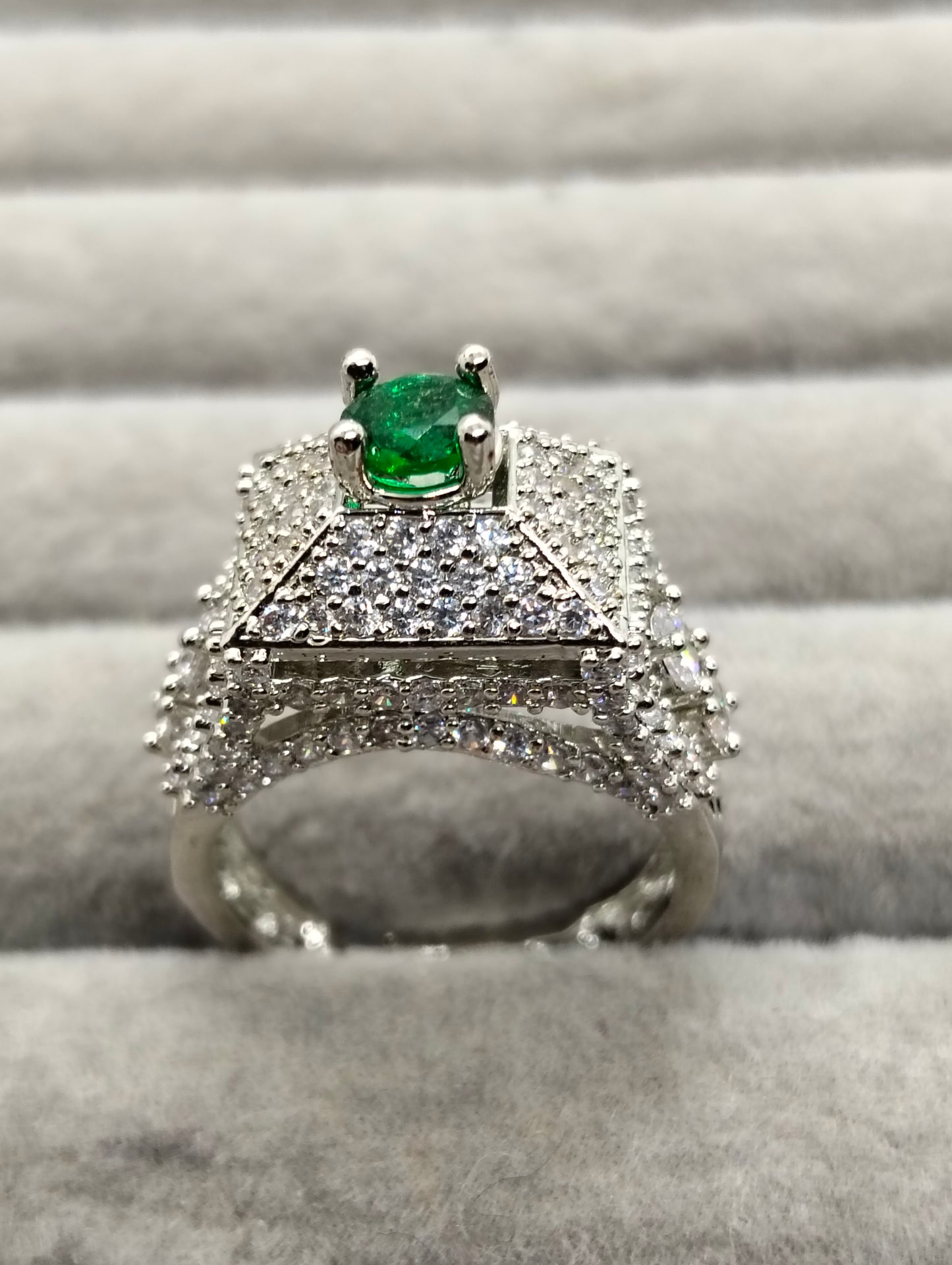 Green stone adjustable tower ring in one carat silver rhodium plated