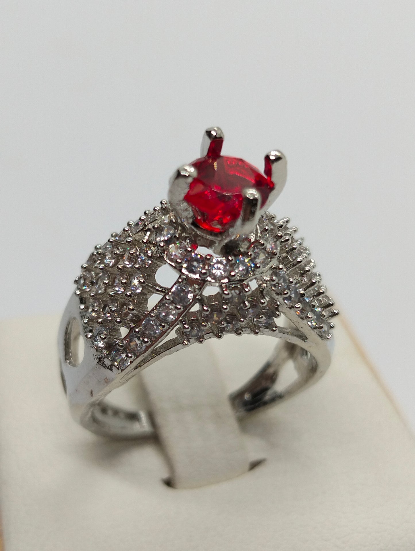 Silver rhodium plated ring in red stone