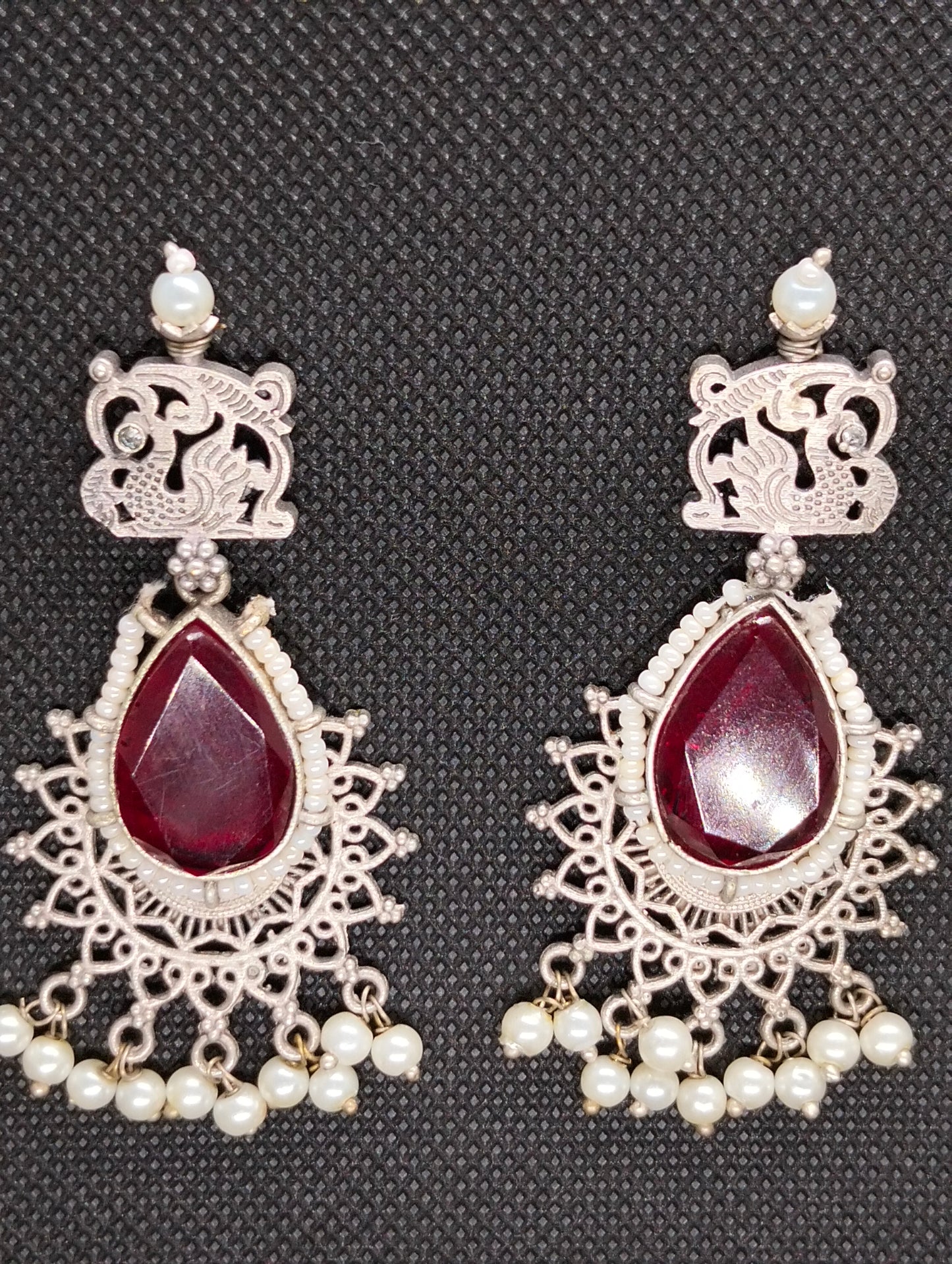 Silver ethnic Oxidized jhumka's in red stone