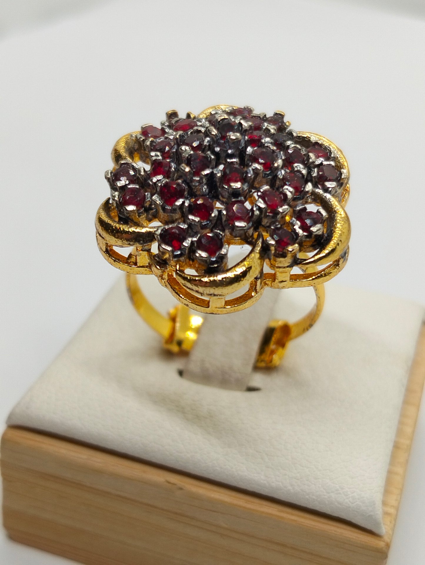 Red stone adjustable ring in casting