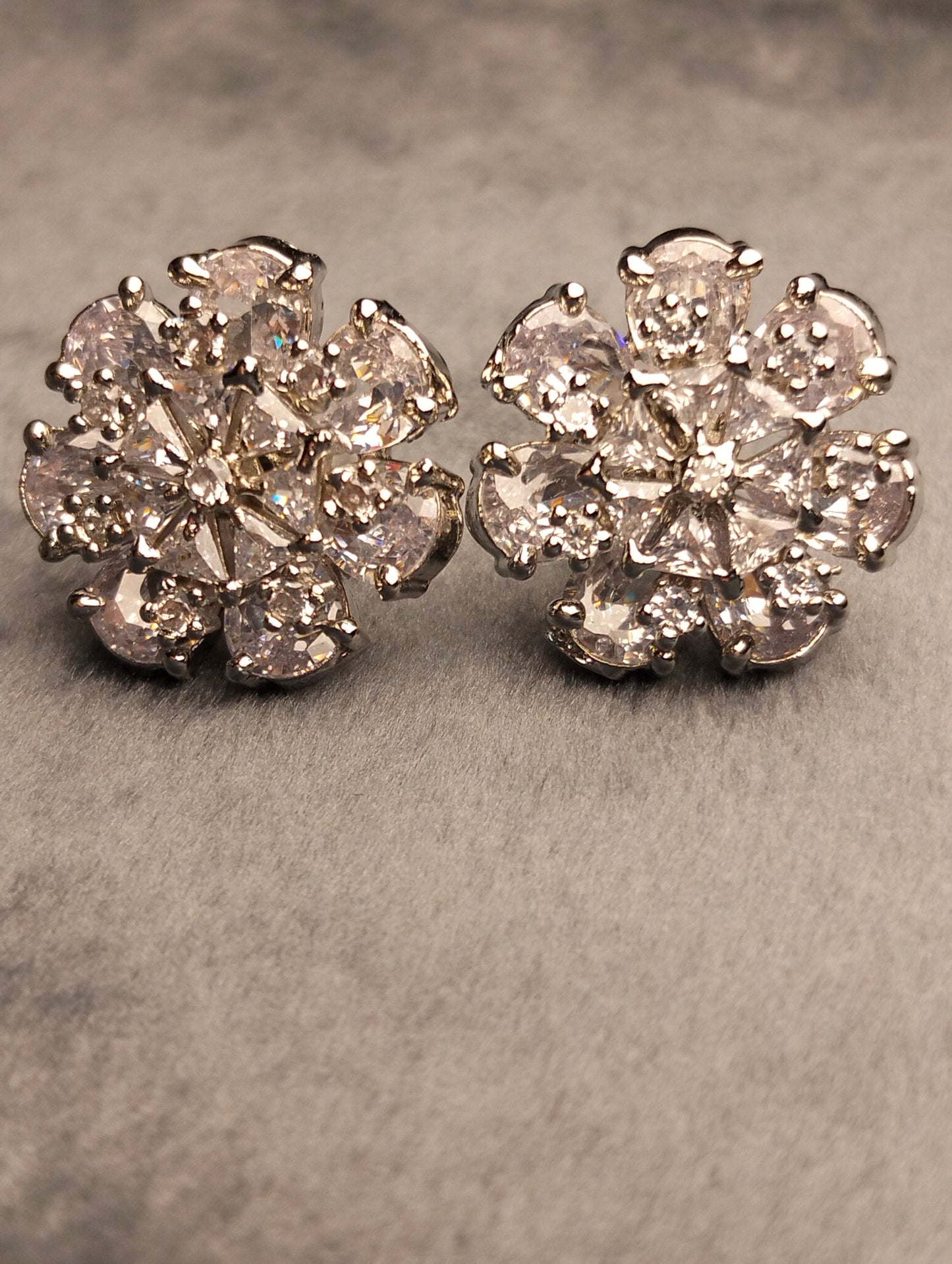 Silver stud in white stone