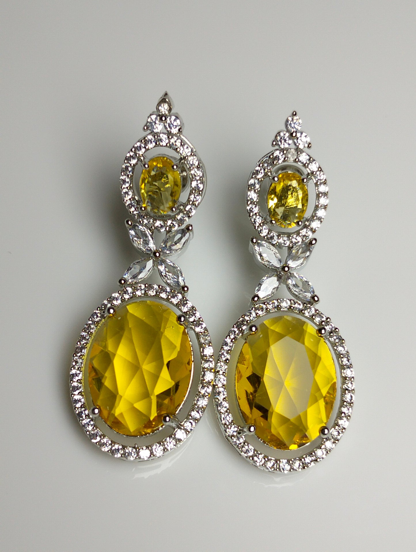 Champagne stone Ad earing silver rhodium plated