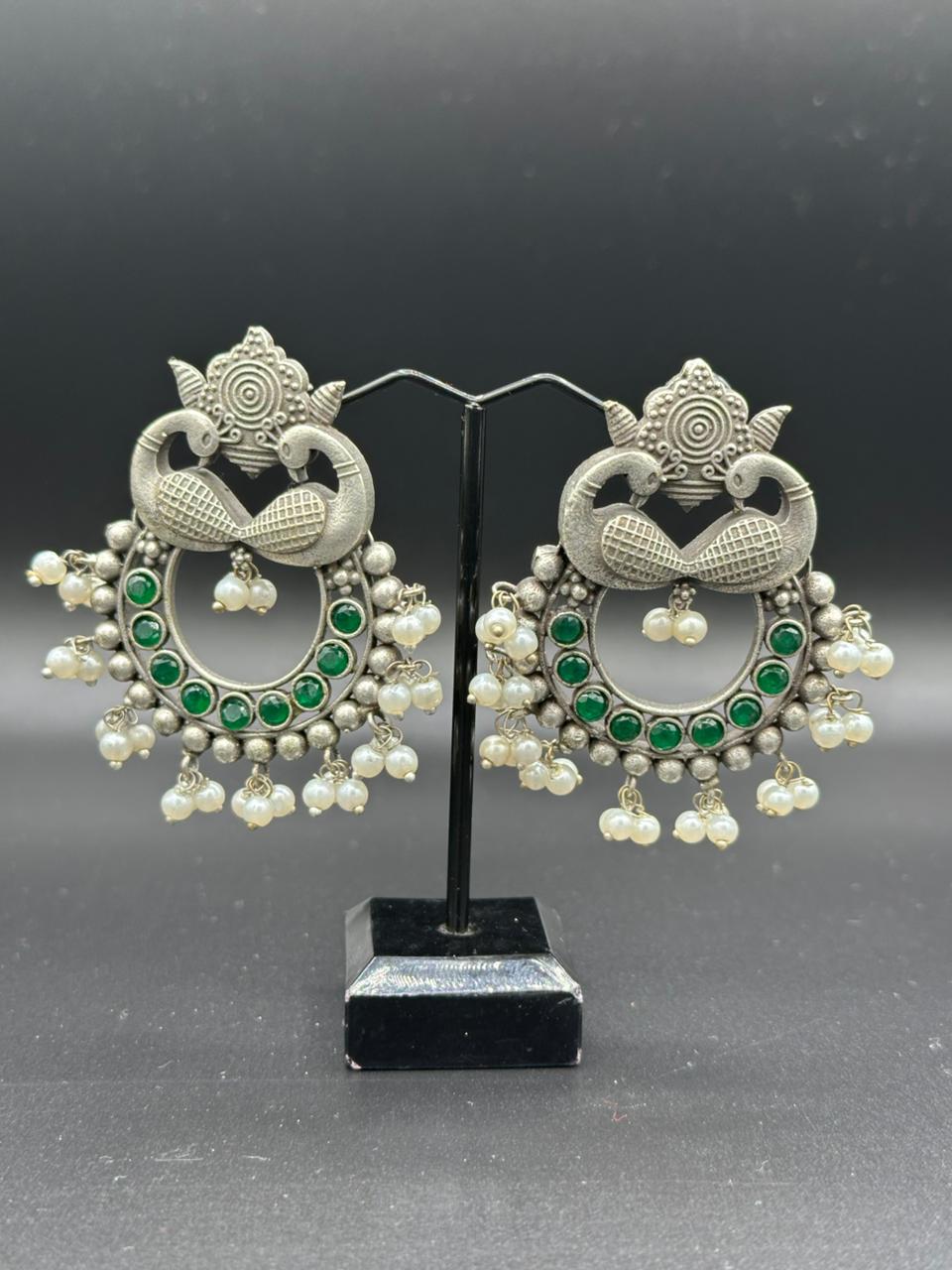 The Peacock Dance | Enameled Green Stone Oxidized Peacock Jhumka's