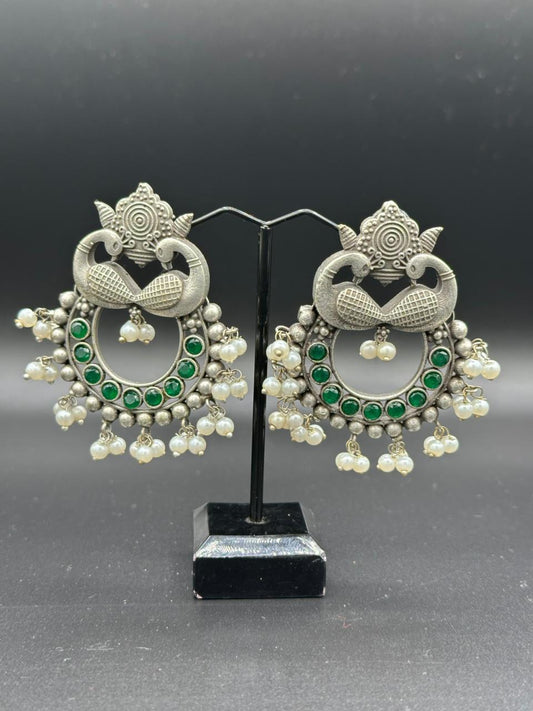 The Peacock Dance | Enameled Green Stone Oxidized Peacock Jhumka's