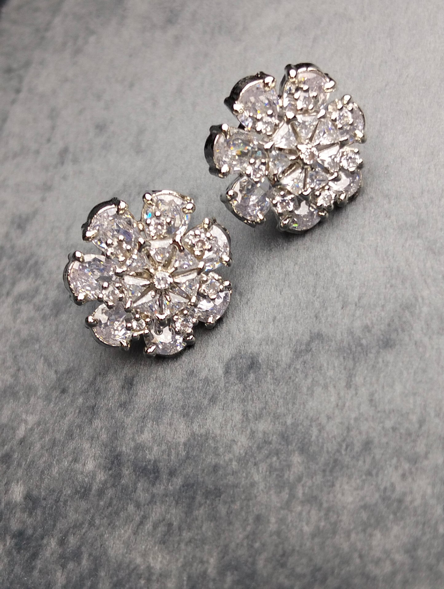 Silver stud in white stone