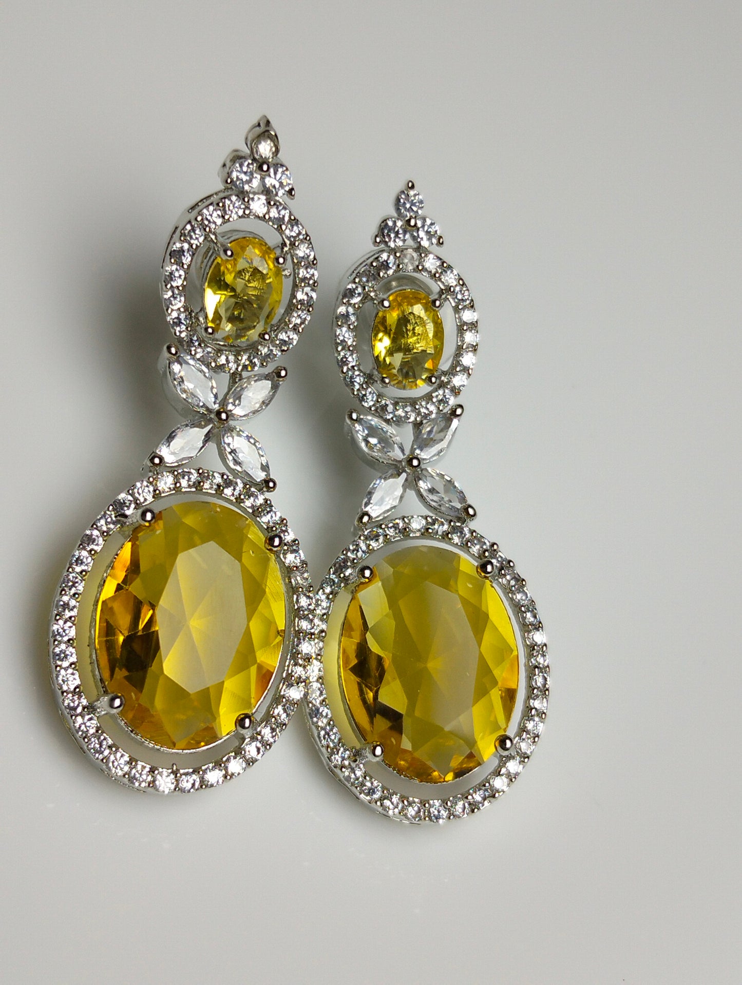 Champagne stone Ad earing silver rhodium plated