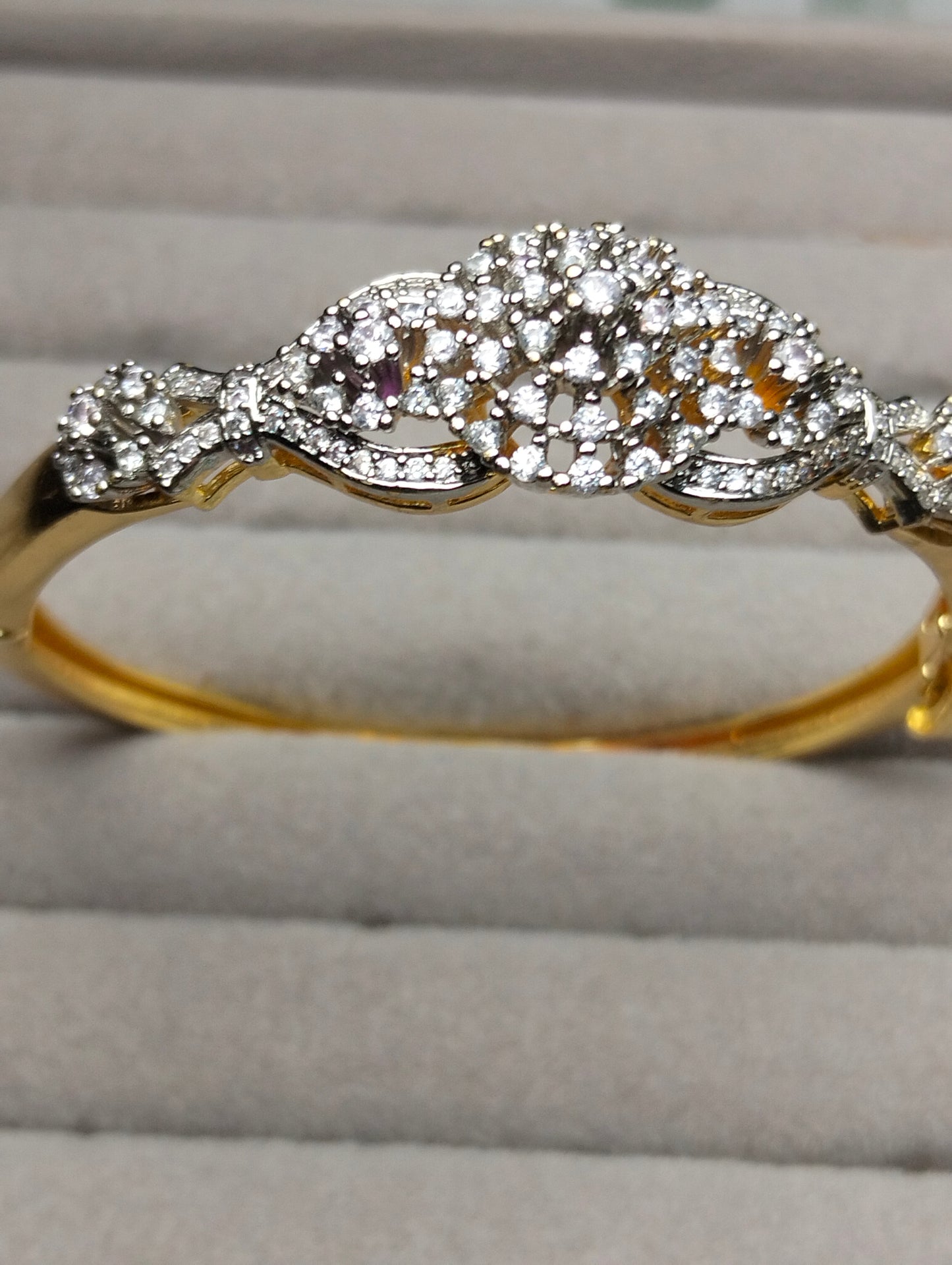 Gold plated openable bangel with cubic zircon