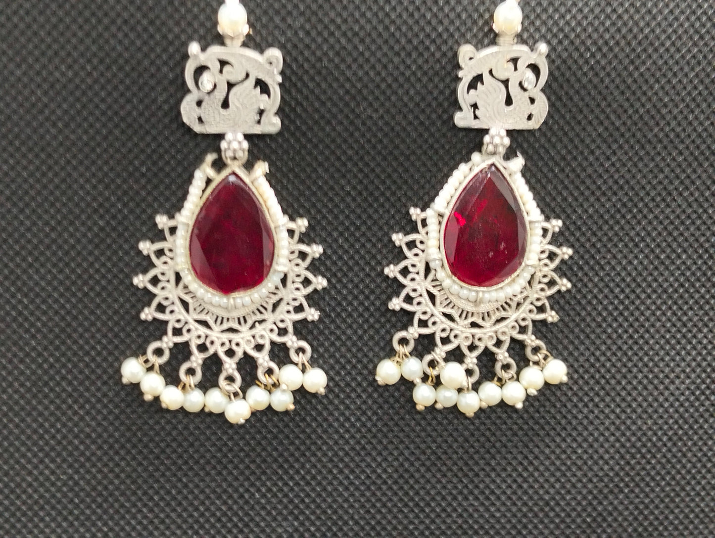 Silver ethnic Oxidized jhumka's in red stone